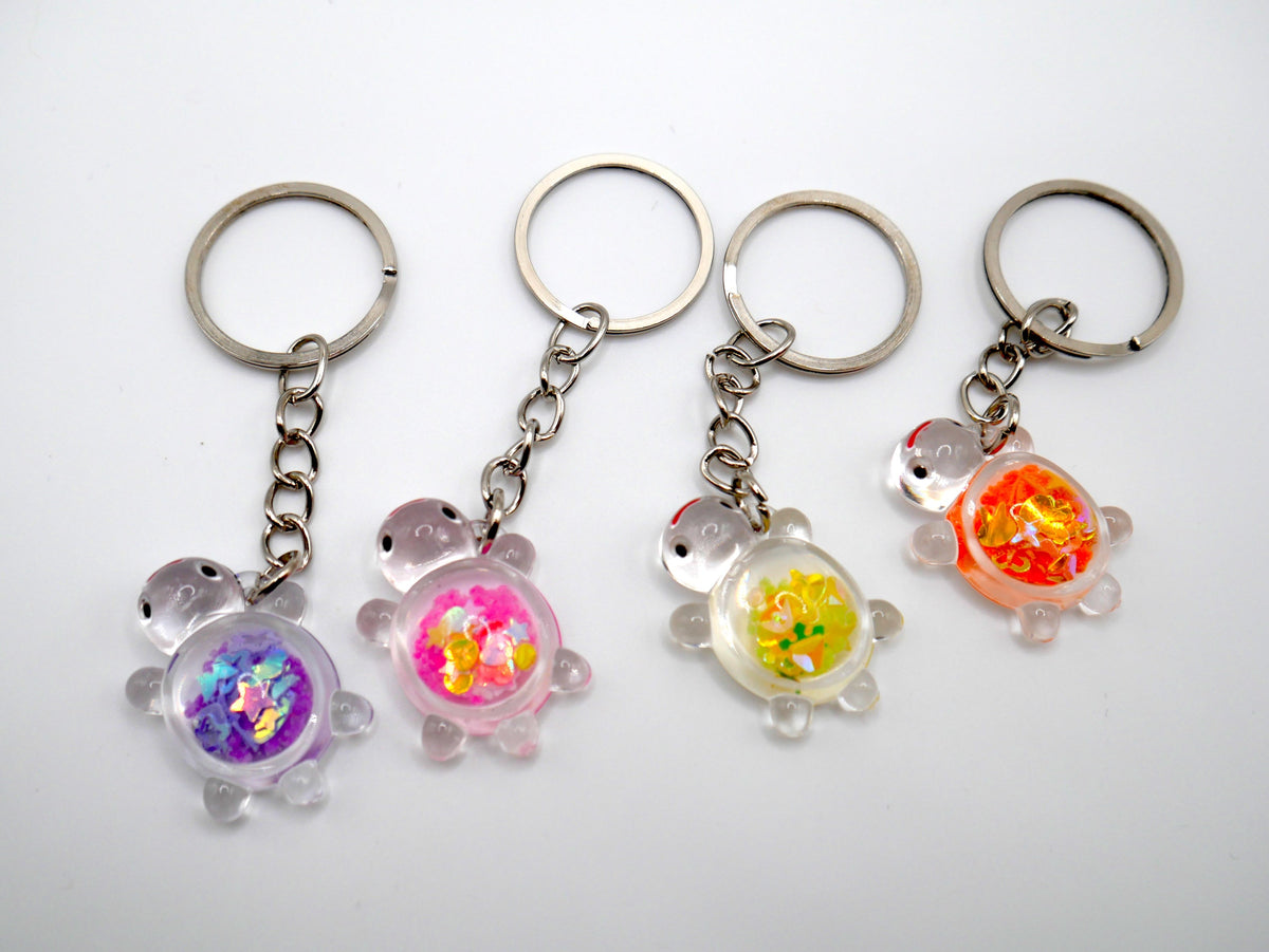 Glittery Glow-in-the-Dark Turtle Keychain and Bag Charm – Consulate X, view 1 of 3